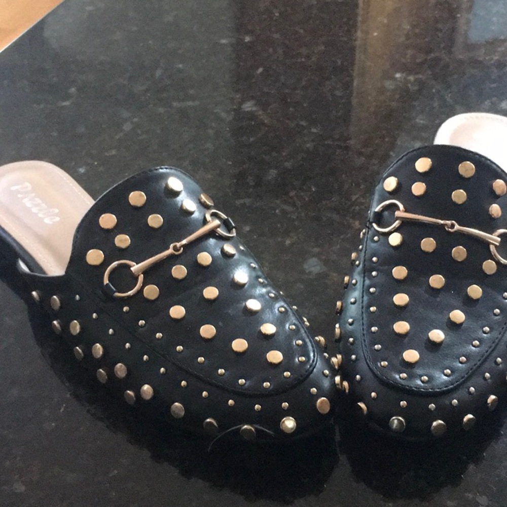 Like new PAZZLE mules, so 7.5, Black with gold metal studs and detailing.